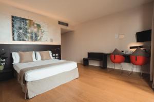 Postel nebo postele na pokoji v ubytování Mod 05 Bike Hotel