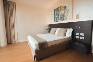 Postel nebo postele na pokoji v ubytování Mod 05 Bike Hotel