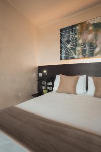 Postel nebo postele na pokoji v ubytování Mod 05 Bike Hotel
