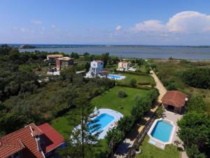 an aerial view of a house with two swimming pools at Gyra Villas - Villa Ermis with private pool in Lefkada