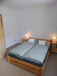 Ένα ή περισσότερα κρεβάτια σε δωμάτιο στο Apartmán u kostela