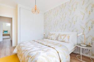 Postel nebo postele na pokoji v ubytování Modern and Spacious Flat @ Oeiras