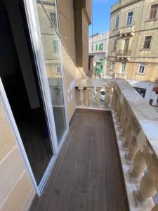a view of a balcony of a building at Sliema - Double Room in Sliema