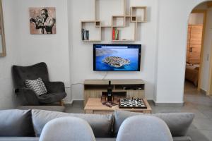 A seating area at Elounda Sonata Luxury