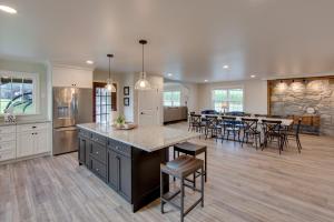 a large kitchen and dining room with a dining table at Patio and Yard Newly Built Retreat in Ronks! in Ronks
