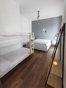 Ένα ή περισσότερα κρεβάτια σε δωμάτιο στο La Casina B&B