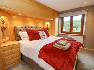 Ένα ή περισσότερα κρεβάτια σε δωμάτιο στο Manor Farm