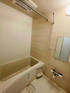 Baðherbergi á STUDIO YONEGAHAMA l 米が浜通