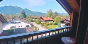 a view from a balcony of a house at Ferienwohnung Bergblick im Tiefenweg 15A in Lenggries