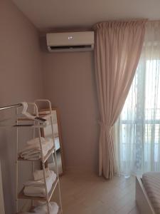 a room with a bunk bed and a window at Casa Twins in Bari