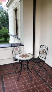 A balcony or terrace at Happy Living Villa