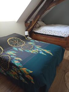 เตียงในห้องที่ La Bruyère - B & B -