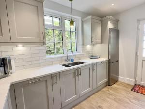 Köök või kööginurk majutusasutuses Coswarth Cottage