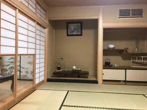 Cette chambre comprend : dans l'établissement SOZENSYA 駅、高速インターに近い新築日本家屋です。庭が広く、BBQも楽しめます。, à Kikugawa