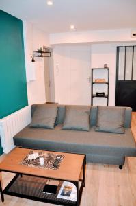 Posezení v ubytování Dormir à Brioude - appartement 'esprit nature'