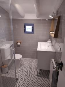 a bathroom with a sink and a toilet at Casa de la Placeta - Casas de Aledo Moratalla in La Risca +32 photos