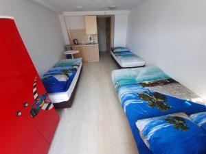 Postel nebo postele na pokoji v ubytování NEMO