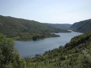 a view of a lake in the hills at Holiday Home Brandsbu - SOW097 by Interhome in Åseral