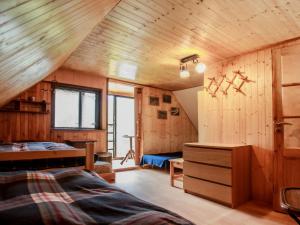 Postel nebo postele na pokoji v ubytování Holiday Home Dolní Jílovice by Interhome