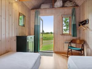 Postel nebo postele na pokoji v ubytování Holiday Home Thana - 8km from the sea by Interhome