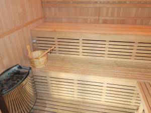 a sauna with a trash can and a bucket at Chalet Krampehaugen - FJS046 by Interhome in Utvik