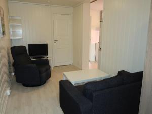 TV a/nebo společenská místnost v ubytování Holiday Home Taren by Interhome