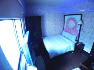 Letto o letti in una camera di Fu Chia Hotel