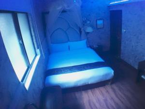 Letto o letti in una camera di Fu Chia Hotel