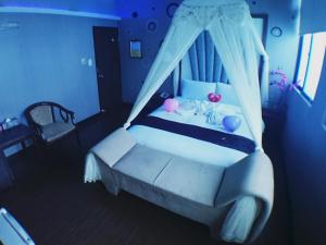 Letto o letti in una camera di Fu Chia Hotel