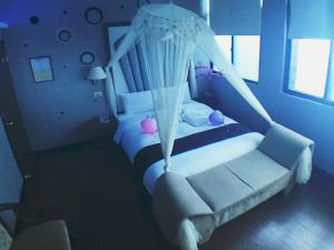 Letto o letti in una camera di Fu Chia Hotel