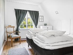 Postel nebo postele na pokoji v ubytování Holiday Home Jaakoppi - all inclusive - 275m from the sea by Interhome