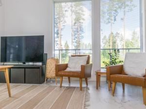 TV a/nebo společenská místnost v ubytování Holiday Home Kuortaneen helmi by Interhome + 14 fotografií