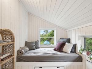 En eller flere senge i et værelse på Holiday Home Annvy - 400m from the sea in NW Jutland by Interhome