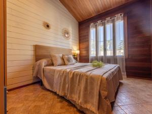 Katil atau katil-katil dalam bilik di Chalet Tropical 3 by Interhome