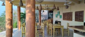 Restorāns vai citas vietas, kur ieturēt maltīti, naktsmītnē Casa Biulú