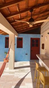 a house with a wooden ceiling and a patio at Trilliza-Verde in Campeche