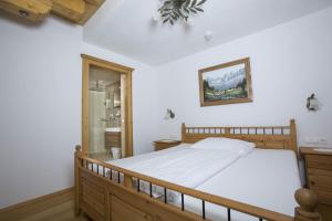 Postelja oz. postelje v sobi nastanitve Hotel Garni Zimmermann