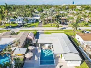 an aerial view of a house with a swimming pool at Modern Pool Home Great for Families in Hollywood