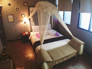 Letto o letti in una camera di Fu Chia Hotel