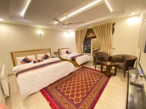 Maria Hotel and Resorts客房内的一张或多张床位