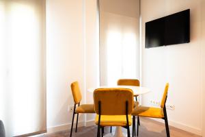 Televízia a/alebo spoločenská miestnosť v ubytovaní CASIVERDE APARTAMENTO
