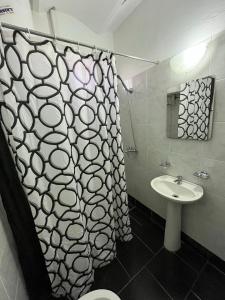 Koupelna v ubytování Hotel Rosario