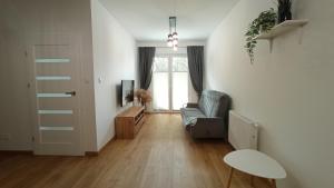 Χώρος καθιστικού στο Apartament DOROTA