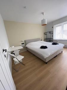 Ein Bett oder Betten in einem Zimmer der Unterkunft Vakantiehuis Joanitas