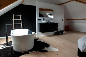 Ein Bett oder Betten in einem Zimmer der Unterkunft Vakantiehuis Joanitas