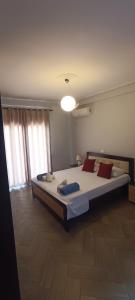 Tempat tidur dalam kamar di Villa Nefeli Prive