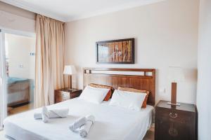 Postel nebo postele na pokoji v ubytování Malibu Mansions Increible apartamento con jacuzzi