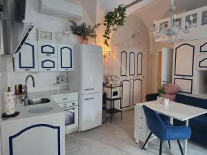 Kuhinja oz. manjša kuhinja v nastanitvi Beautiful apartment in the heart of the center and the old town