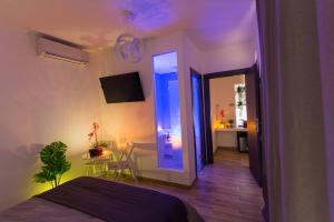 ETNEA 208 LUXURY JACUZZI SUITE Catania客房内的一张或多张床位