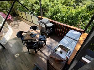 an overhead view of a deck with a computer on it at Cocolhu in Tamarindo